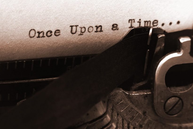 A photo of an old type writer with focus on the text