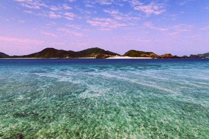 Deserted Japanese tropical islands with clear blue water of a coral lagoon, Kerama Islands National Park, Okinawa