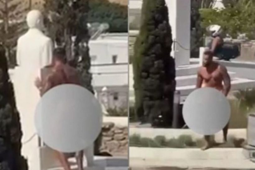 Ολόγuμνος τύπος φάσωσε το άγαλμα του Καραμανλή στη Μύκονο